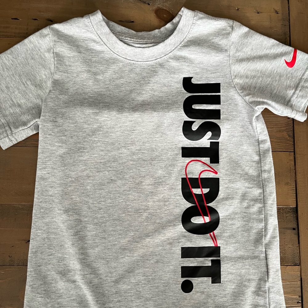 Grey Nike boys short sleeve t-shirt, size 6.